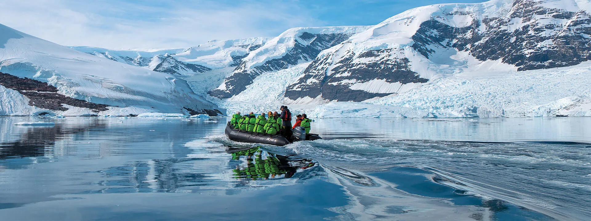 Zodiac boat among Antarctic ice