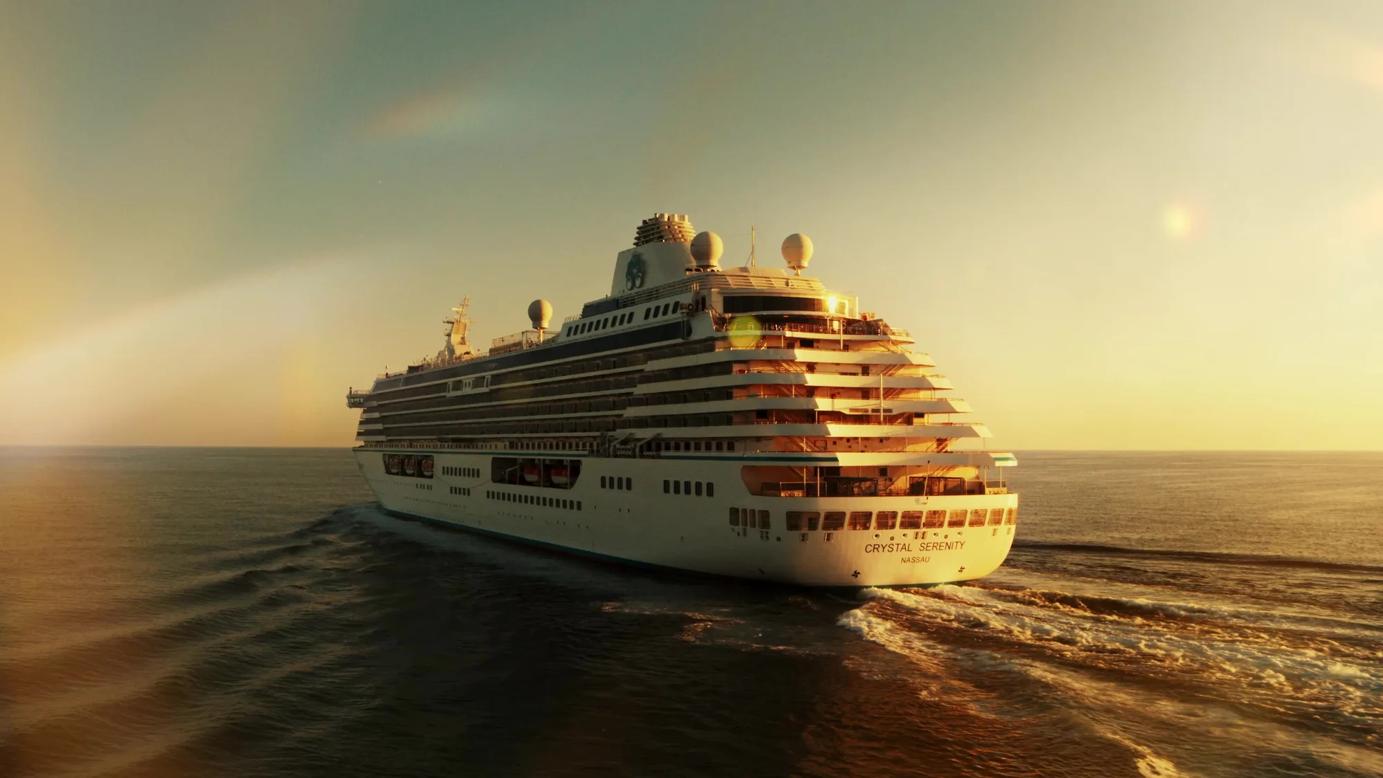 Ship at sea at sunset