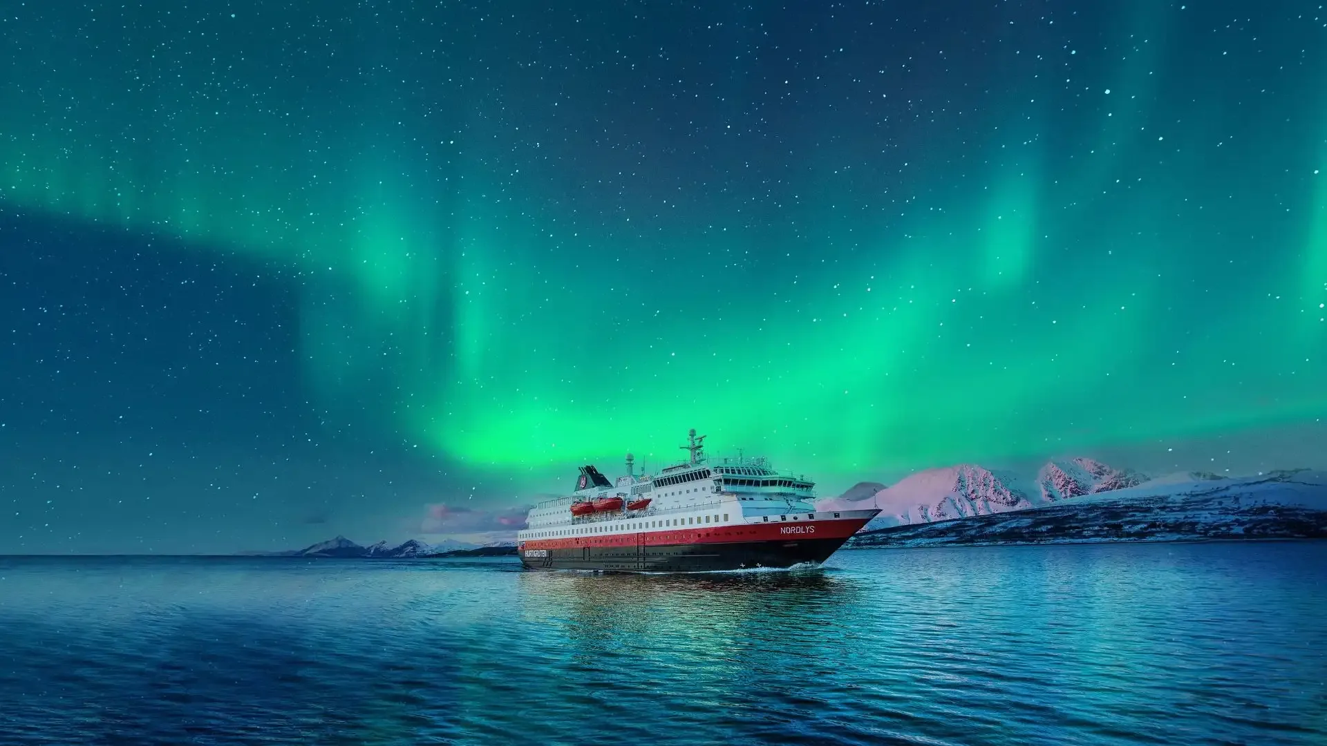 Ship beneath the northern lights