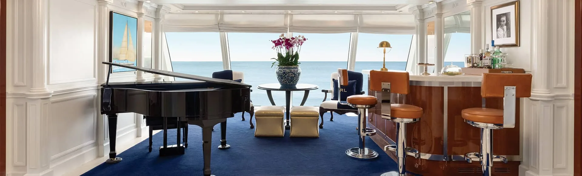 Lounge with a grand piano aboard ship