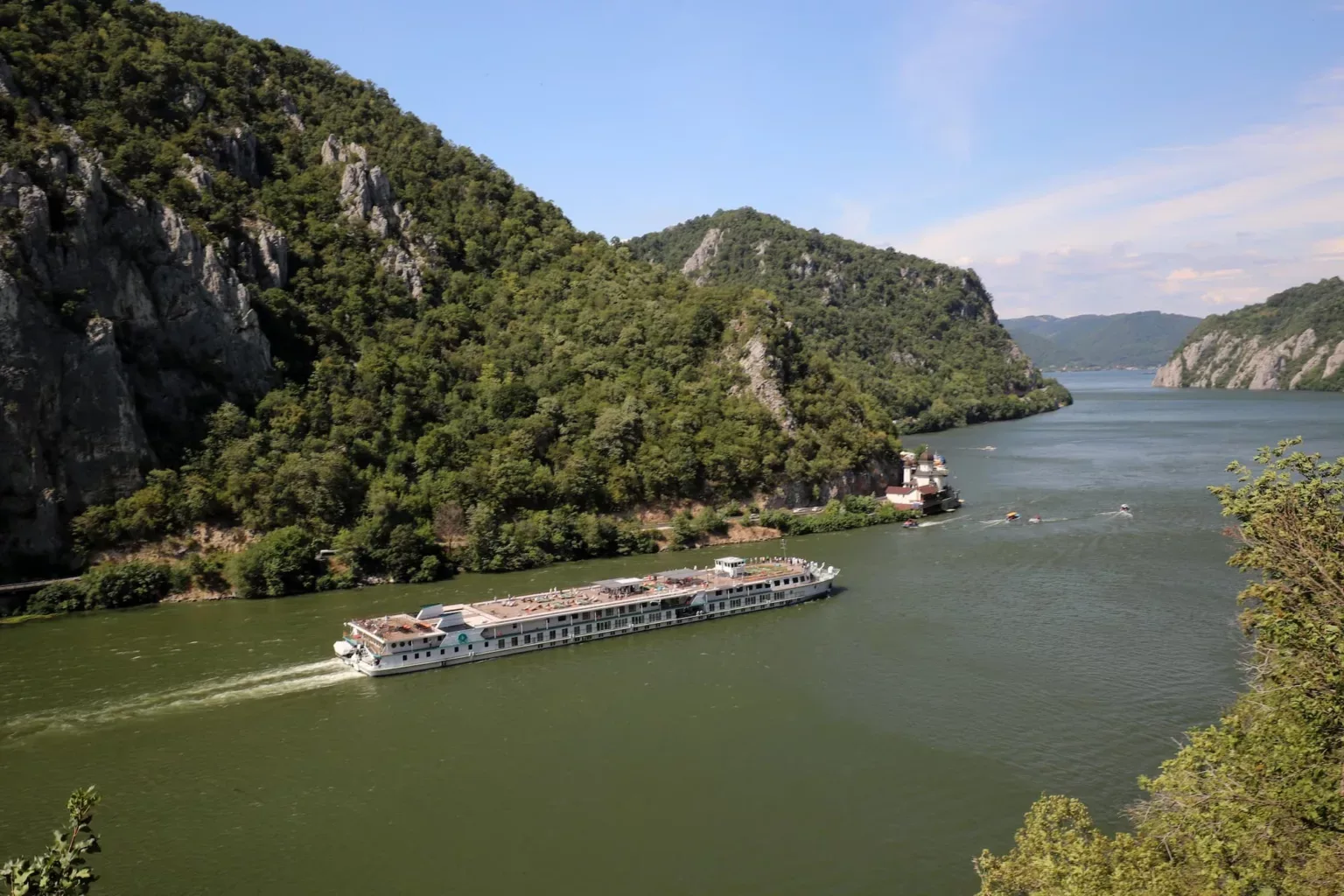 River ship passing through a gorge