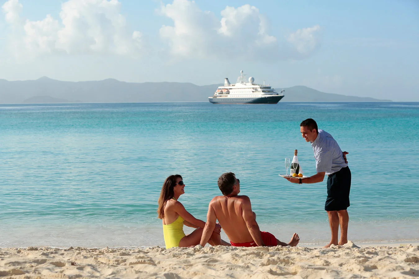 Yacht anchored off a beach