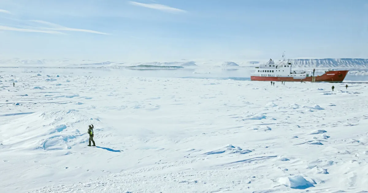 Small expedition ship in sea ice