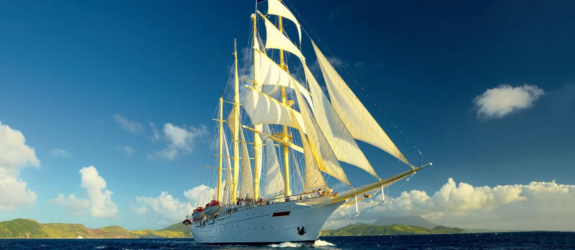 Tall ship under full sail